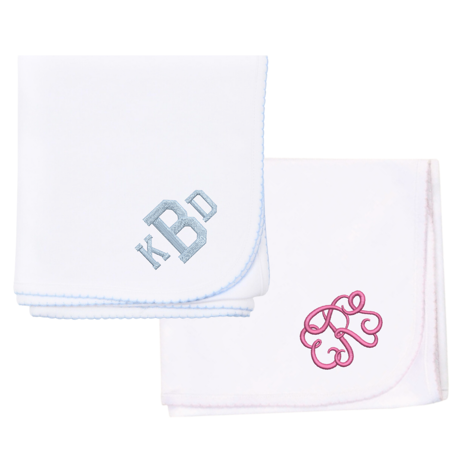 Two white towels with delicate embroidered initials
