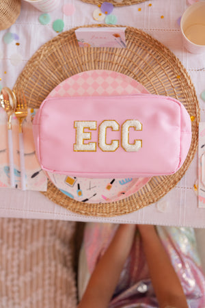 Light pink pouch featuring the initials 'ECC'