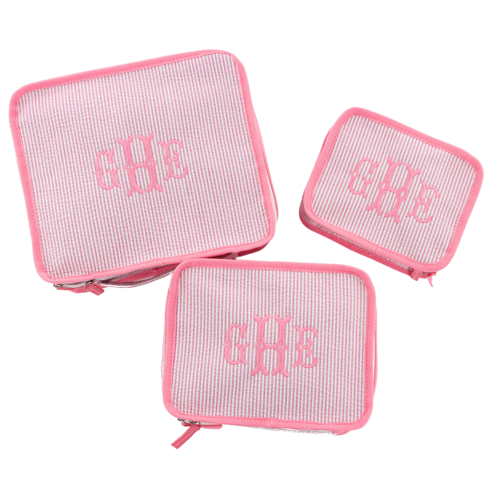 Pink seersucker pouch with 'GHE' initials embroidered in pink in 3 sizes.