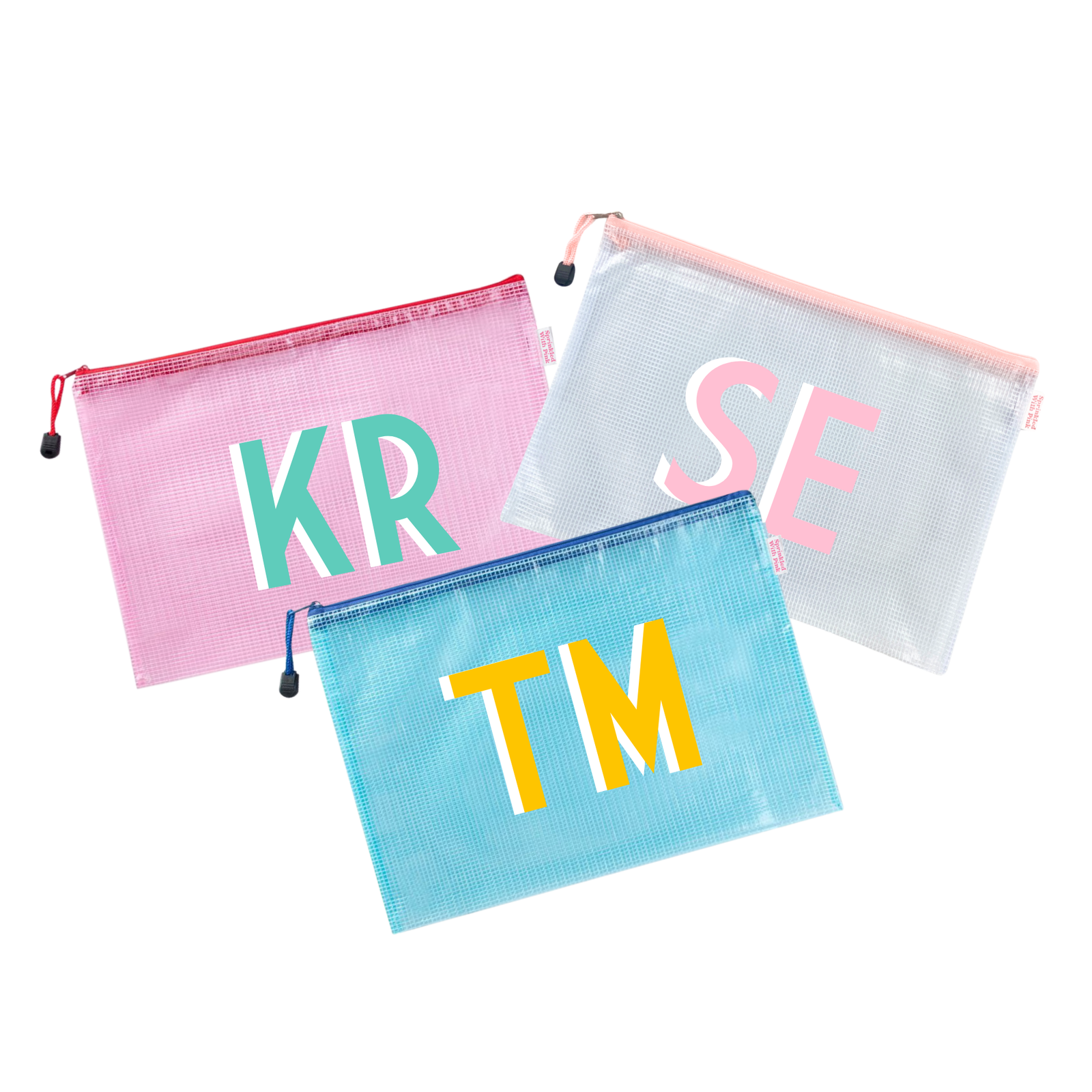 Three personalized mesh pouches: a pink pouch, a white pouch and a blue pouch.