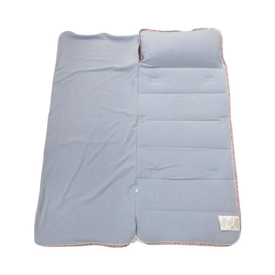Solid light blue Nap Mat featuring a built-in pillow and soft attached blanket, finished with a subtle floral trim—ideal for daycare, preschool, or cozy on-the-go naps. A comfortable and practical all-in-one sleep solution for toddlers.