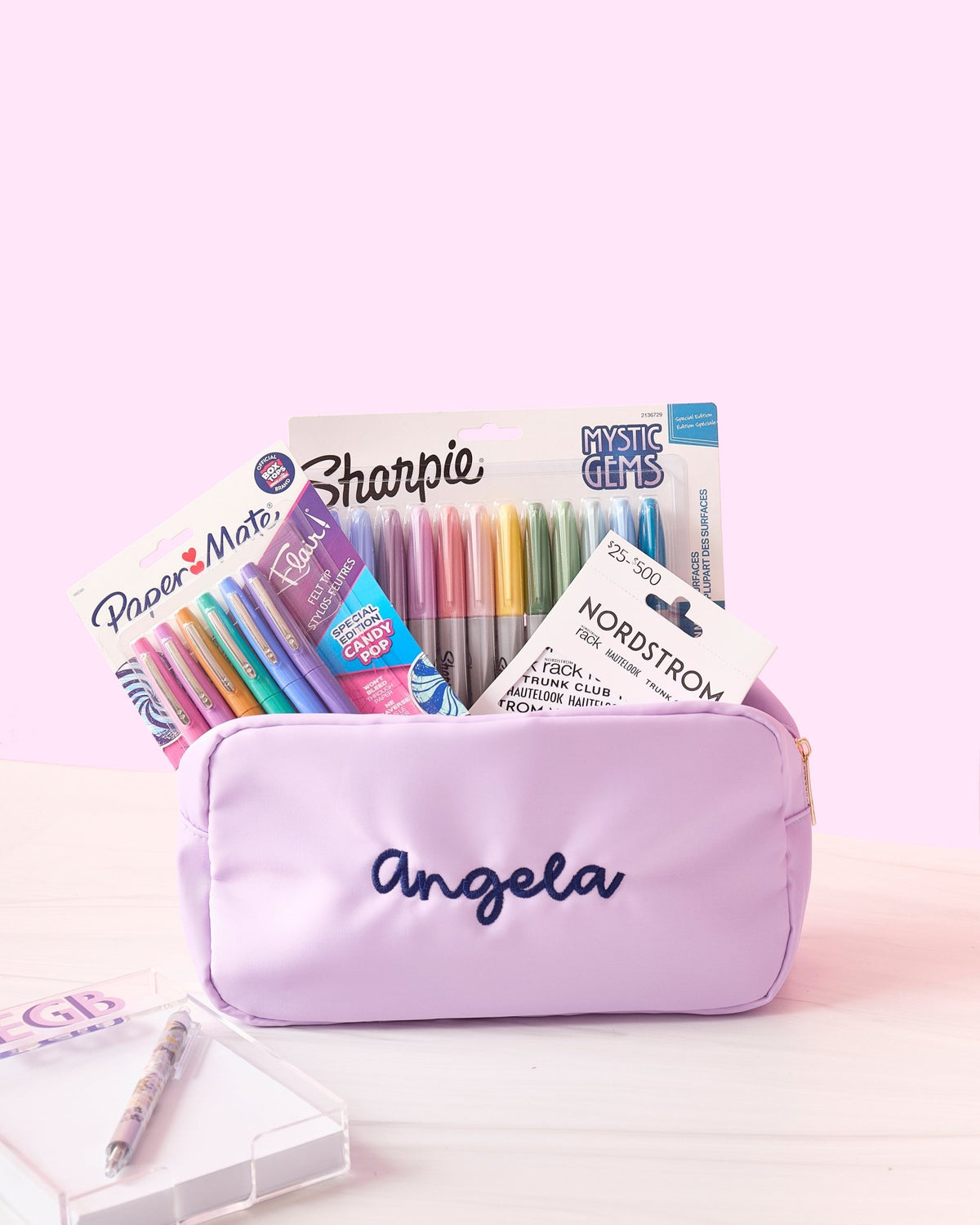 A personalized lavender rectangular toiletry bag.